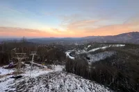 snowy chairlift at Ober Mountain