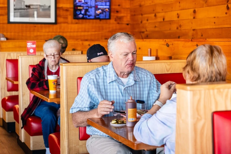 guests at Buddy's BBQ, one of the top Sevierville restaurants